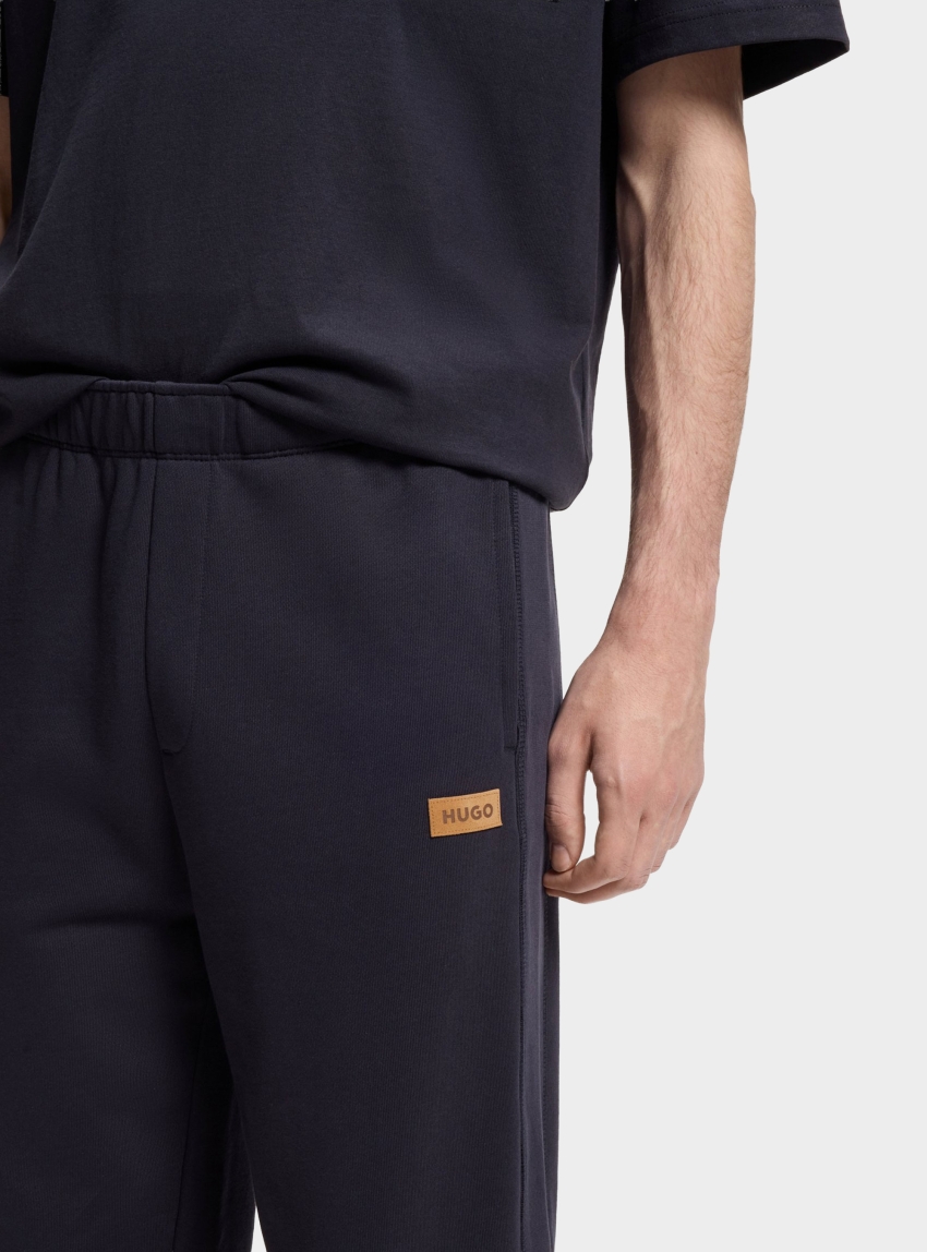 HUGO Cotton-Terry Tracksuit Bottoms With Logo Badge  Nevatro - Dark Blue