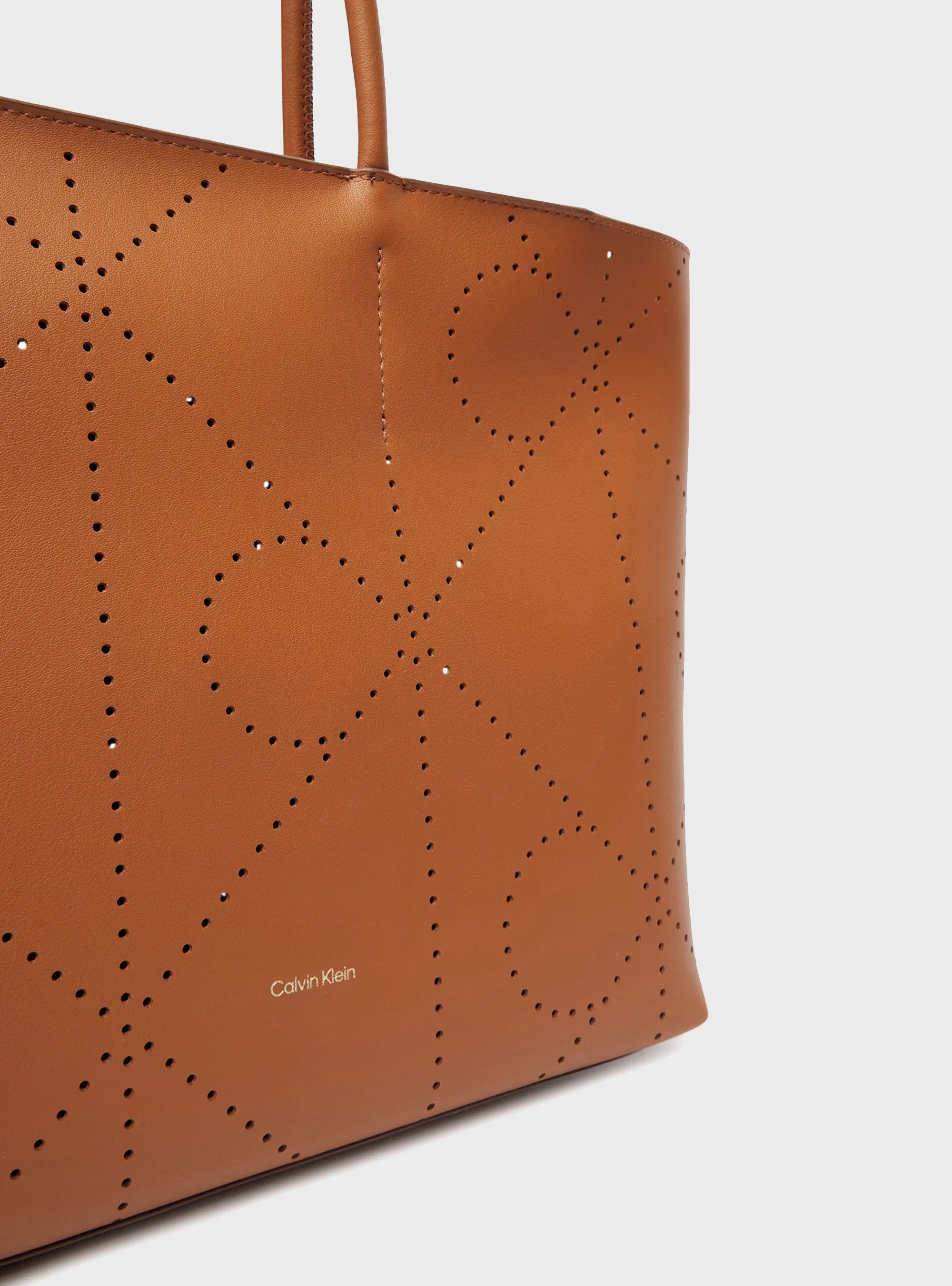 Calvin Klein All Over Print Perforated Tote Bag - Rust