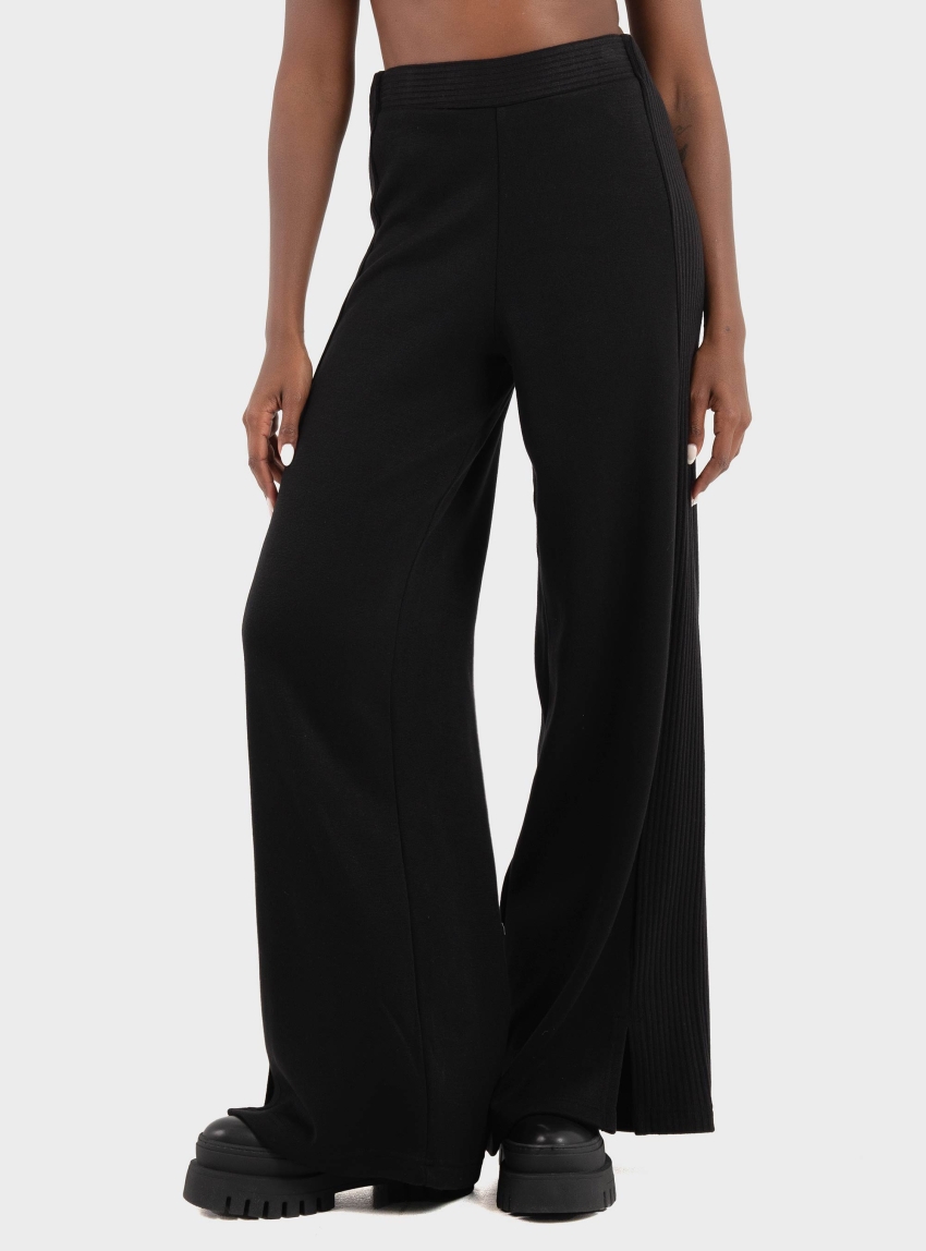 Ioanna Kourbela 'Softwear' Trousers With Elastic Waistband And Side Rib Panels With Small Slits - Black